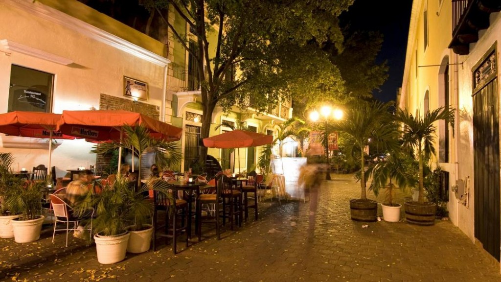 Cafe in small alley in the Zona Colonial at night, Santo Domingo.