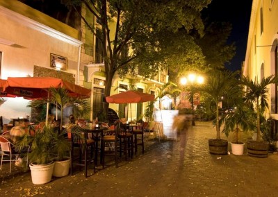Cafe in small alley in the Zona Colonial at night, Santo Domingo.